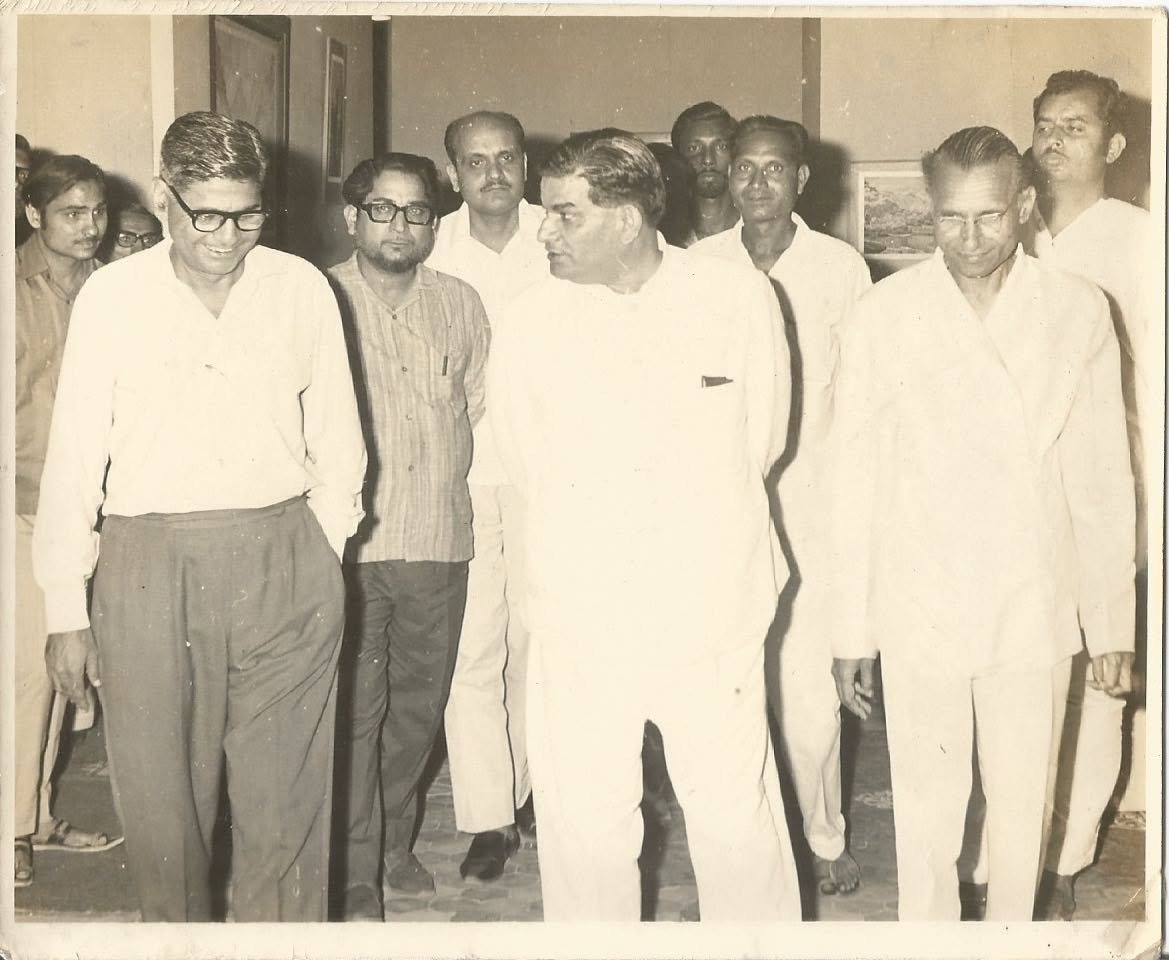 Dr. Gopal Tripathi, then Vice-Chancellor of Lucknow University, viewing the exhibits at Prof. Sukhvir Sanghal's solo exhibition held at the State Lalit Kala Akademi, Uttar Pradesh, alongside the artist and other distinguished artists, May 1972.