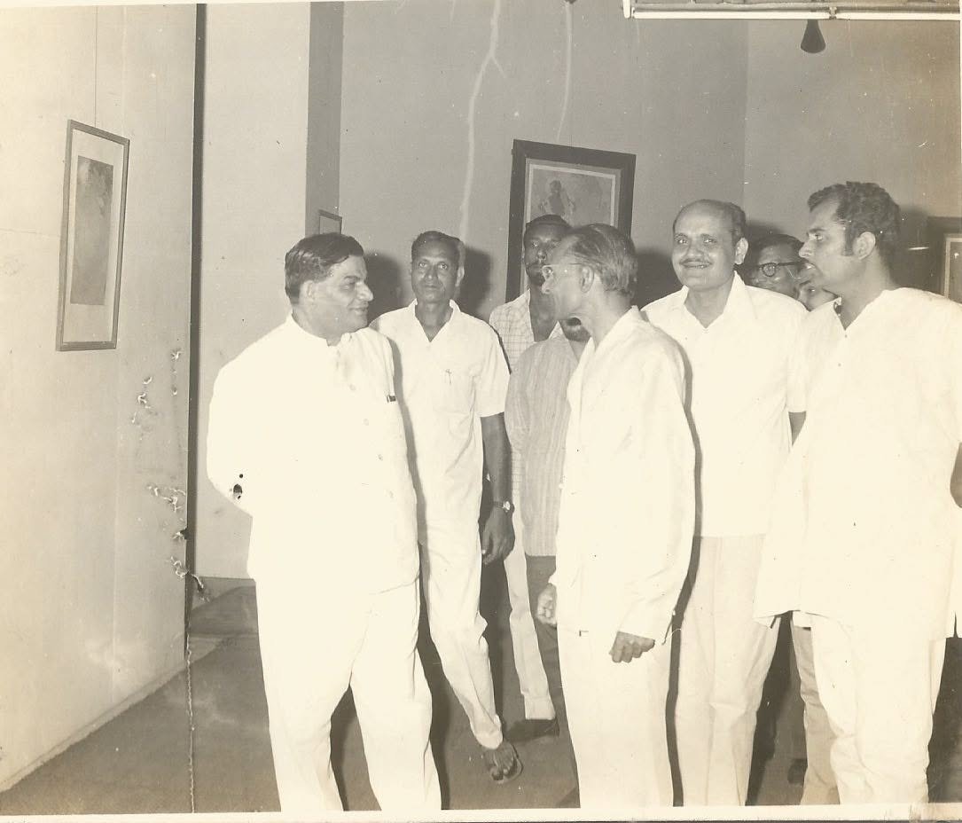 Dr. Gopal Tripathi, then Vice-Chancellor of Lucknow University, viewing the exhibits at Prof. Sukhvir Sanghal's solo exhibition held at the State Lalit Kala Akademi, Uttar Pradesh, alongside the artist and other distinguished artists, May 1972.